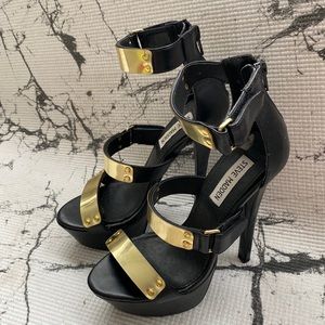 Steve Madden heels.  Black with gold metal.